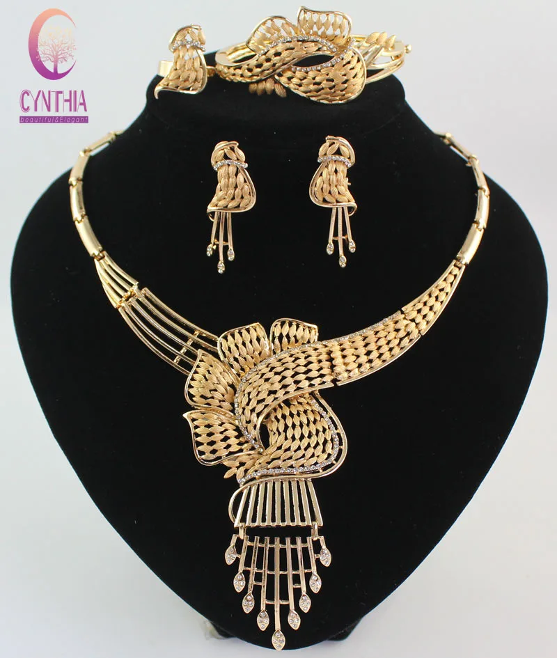 

Top Quality Luxury Wedding Bridal Luxury Gold color Crystal African Tassel Crystal Statement Necklace Earring Jewelry Party Set