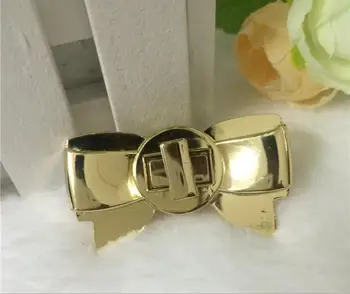 

Free shipping Bag with Parts & Accessories (6 PCS/lot), the new golden metal bowknot adornment twist lock