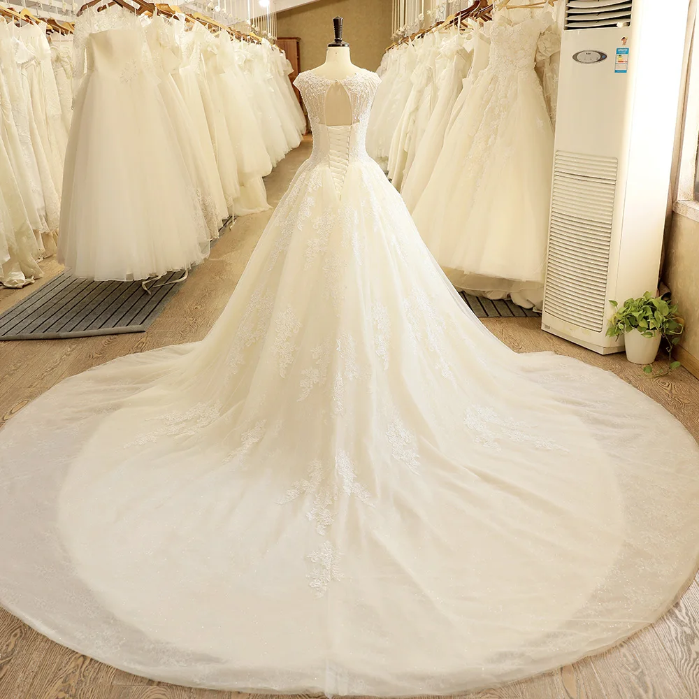 SL-125 белое свадебное платье с открытой спиной, расшитое бисером, свадебное платье бохо, Кружевная аппликация, часовня, поезд, свадебное платье, Топ 10, свадебные платья