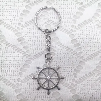 

100pcs/lot Bulk Packing Nautical Style DIY Wedding Favors Party Gifts Back Gifts for Guests Silver Color Rudder Design Keychain