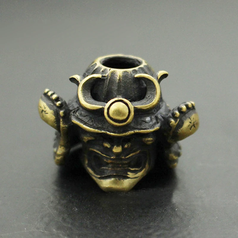 

Samurai Brass Knife Skull Beads Umbrella Rope Cord Outdoor Knife Pendant Japanese Helmet Paracord Beads