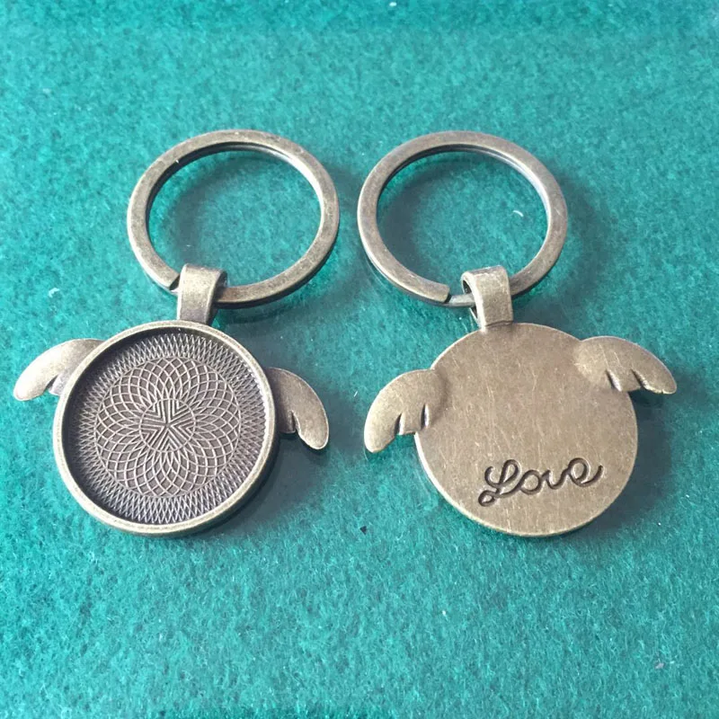 

6PCS/Lot Vintage Key Charm 25mm Angel Wing Round Cabochon Setting DIY Blank Cabochon Handmade Key Ring