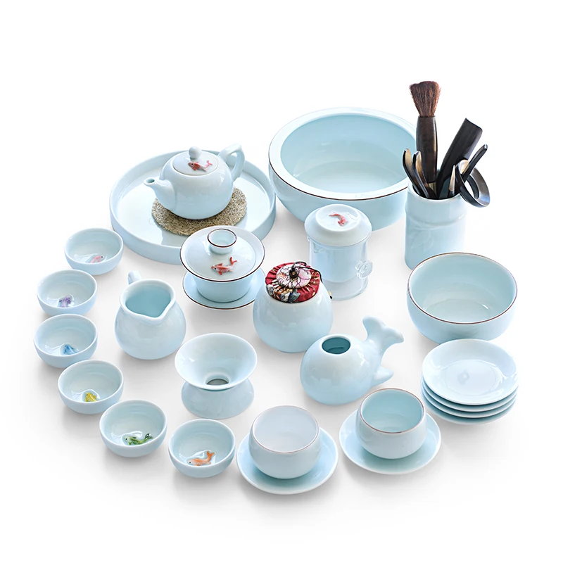 

Brief Solid Color Porcelain Tea Set for Wedding Gift Embossed Fish Teacup Handle Cha Hai Tea Strainer Teapot Gaiwan Tray Teaware