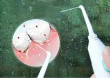 DIY oral dental irrigator tooth cleaner for cleaning teeth hand press water jet as oral hygiene clean AS SEEN ON TV.