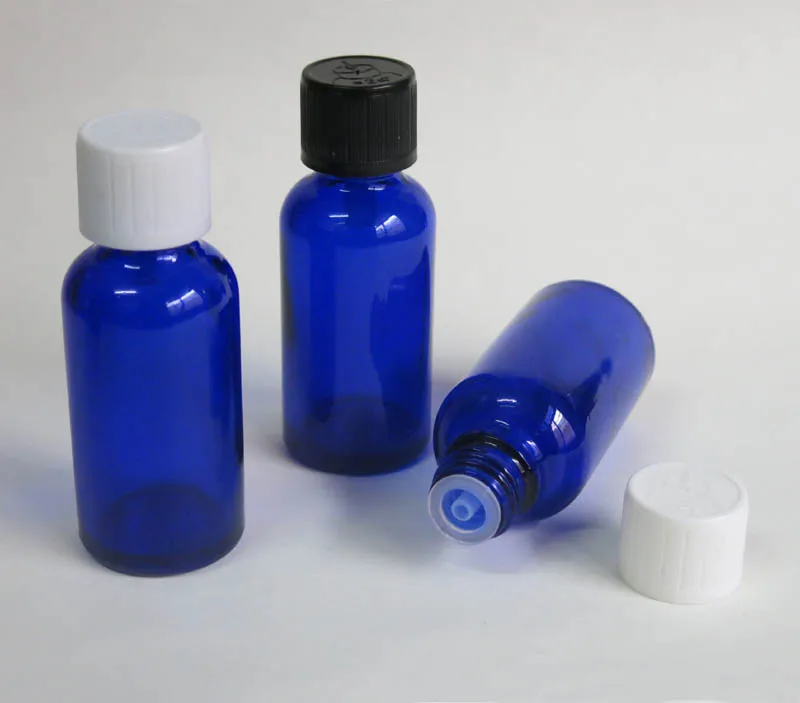 Wholesale 100pcs 1 ounce Small Glass Bottle With lid, glass 1 oz