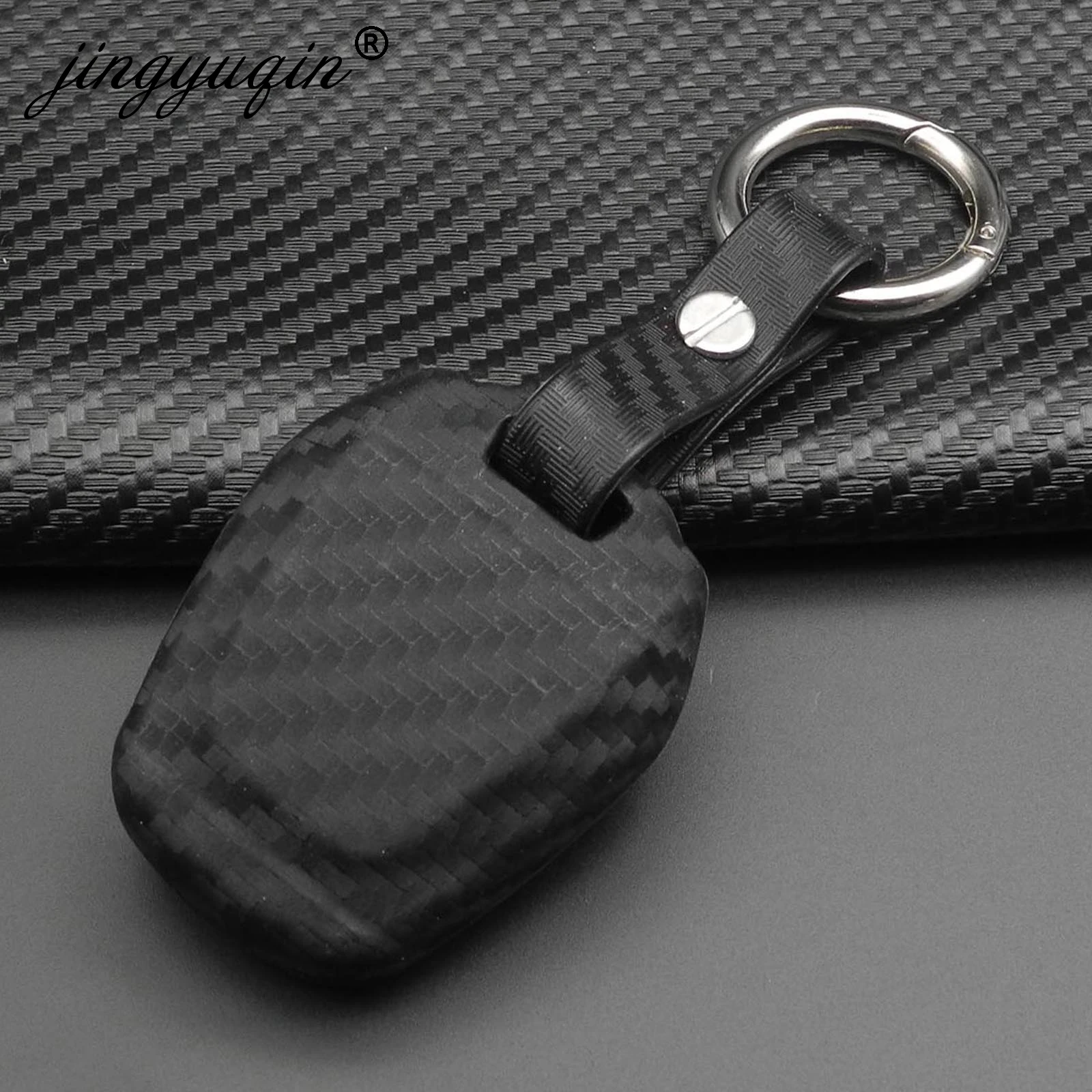 Jingyuqin-in-fibra-di-carbonio-Silicone-telecomando-Fob-portachiavi-per-Isuzu-DMAX-D-MAX-mu-x.jpg Keyforkess in fibra di carbonio Silicone telecomando Fob portachiavi per Isuzu DMAX D-MAX mu-x 2.5 2 pulsanti accensione caso chiave dell'automobile - Jingyuqin in fibra di carbonio Silicone telecomando Fob portachiavi per Isuzu DMAX D MAX mu