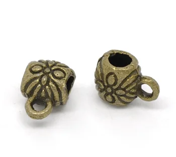 

DoreenBeads 100 Bronze Tone Flower Pattern Bail Beads 9x6mm (B14506)