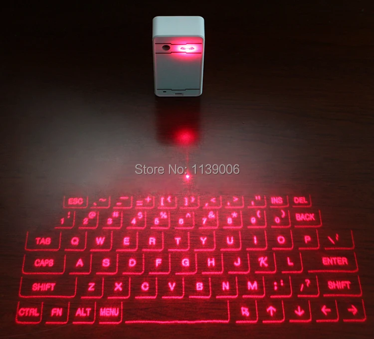

Free Shipping Original Mini Wireless Projection Virtual Bluetooth Laser Keyboard for Smart phone PC Tablet Laptop