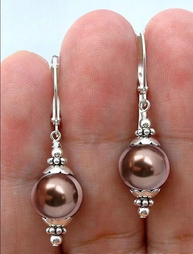 

Free Shipping >>>> charming chocolate shell Pearl Silver hook Earrings