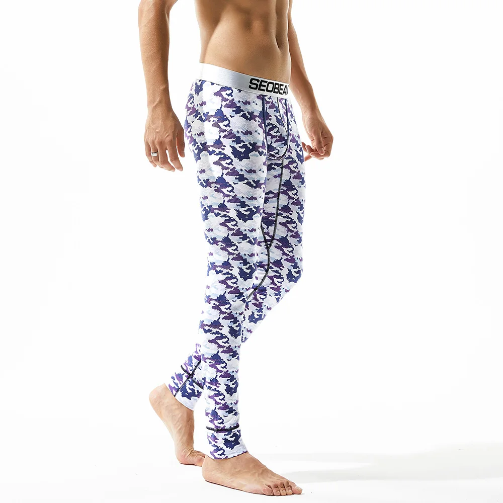 Comprar Ropa interior térmica de moda para hombres pantalones largos de algodón calzoncillos Sexy bolsa apretada Legging para hombre pijama ajustado inferior pantalón de dormir baja altura