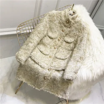 

New winter heavy tassels weaving tweed coat + nail bead temperament skirt of tall waist A word women suits