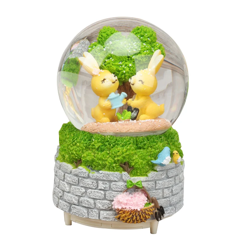 

Creative Cartoon Rabbit Lights Rotating Music Box Crafts Pastoral Bunny Crystal Ball Music Box Home Decoration Student Gifts