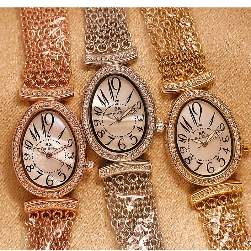 Горячие новые модные овальные женские часы маленькие женские топ брендовые роскошные женские часы Кварцевые водонепроницаемые алмазные Наручные часы для женщин со стразами