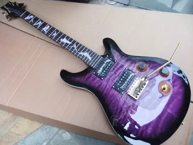 

Wholesale New electric guitar 24F mahognay body with bat inlay in purple burst 110420