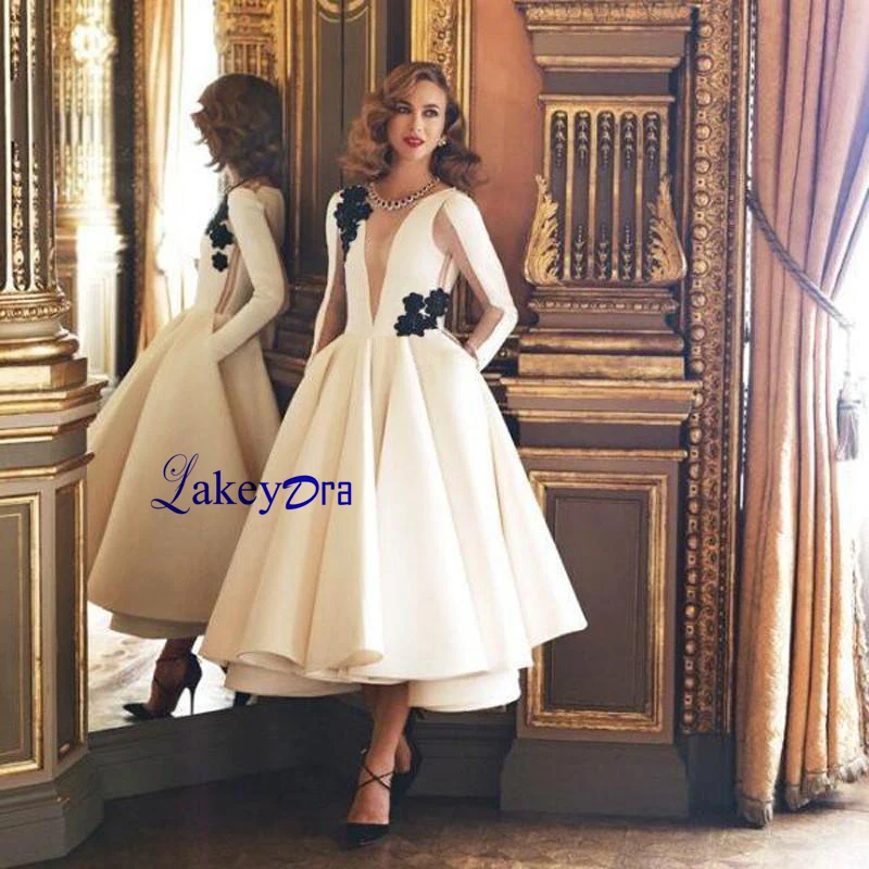 

Lakeydra White Plus Size Evening Dress Short A-Line Sheer Deep V-Neck Satin with Appliques Zipper Back Long Sleeve Party Gowns