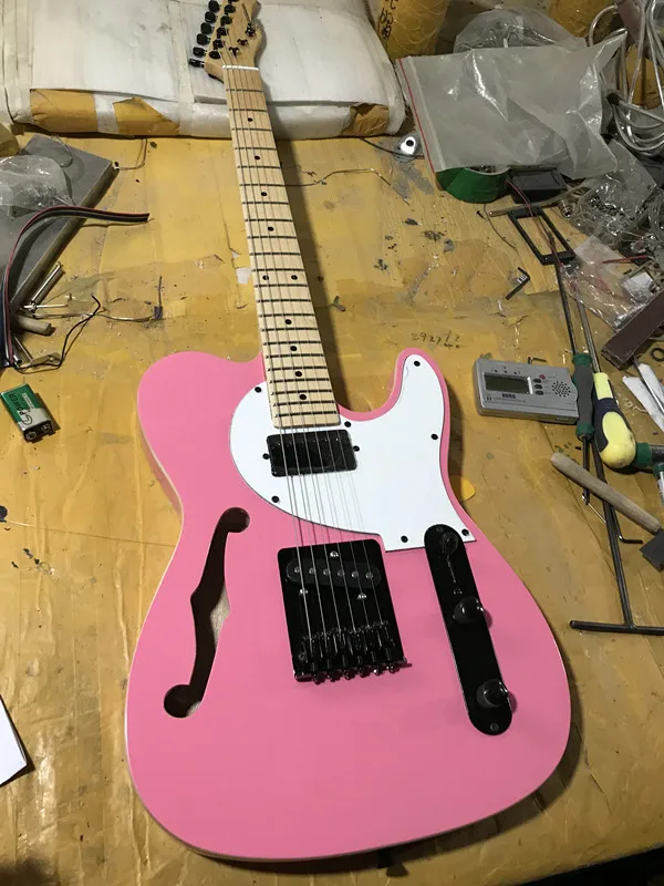 

The factory exports high quality pink TL electric guitar F hole Black accessories free delivery