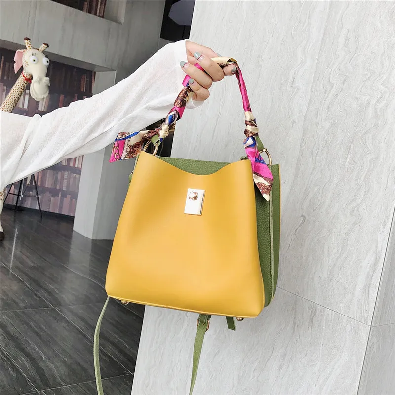 

Bag women 2019 new European and American fashion color bucket bag Joker lock scarf handbag