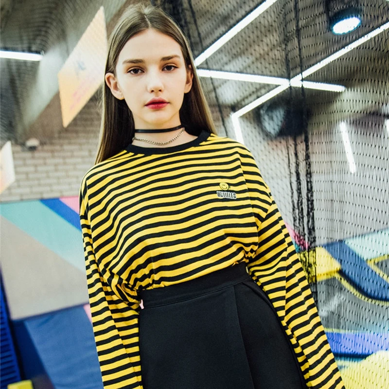 yellow and black striped long sleeve shirt