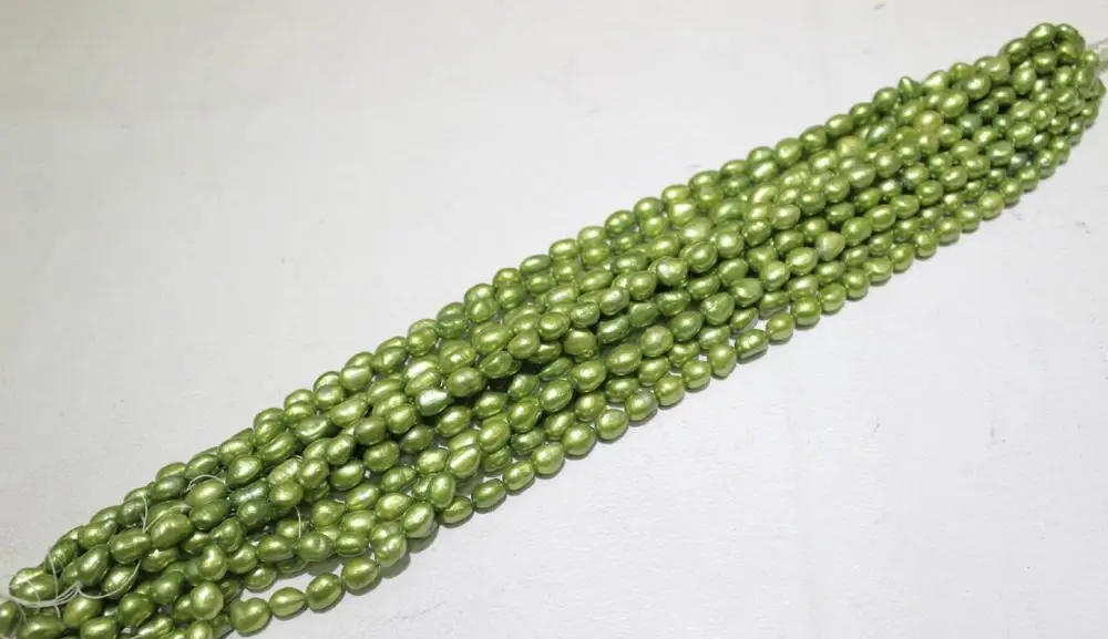 

Green rice Fresh water pearl necklace 8x10mm 15 "Handmade"No Metal