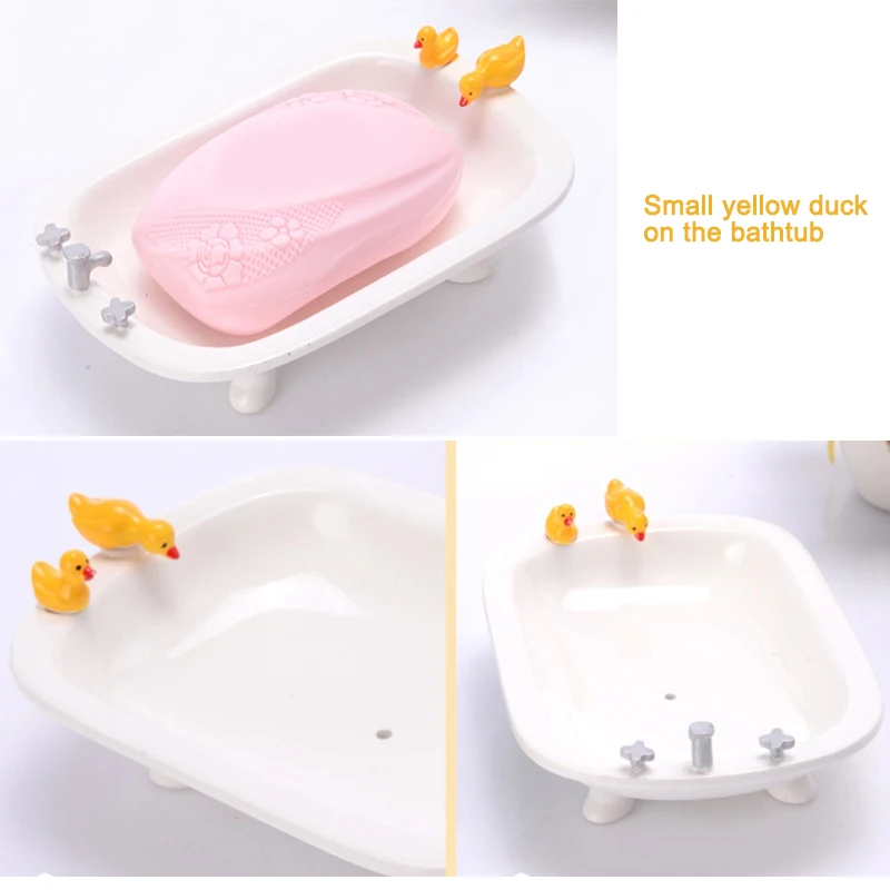Small yellow duck on the bathtub (2)