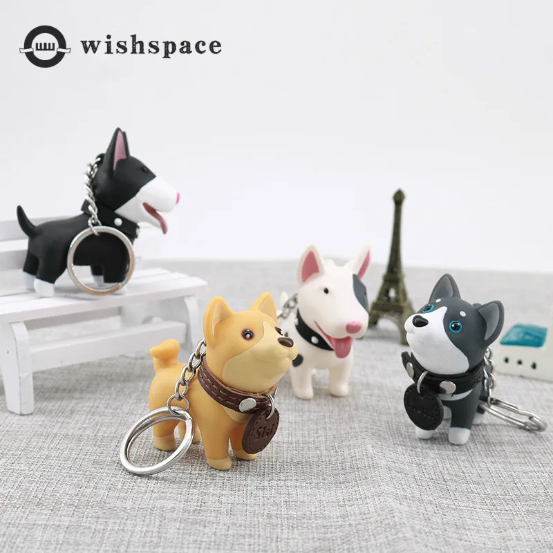 

The European and American popular cartoon cute puppy fashion handbag vehicle hang key chain