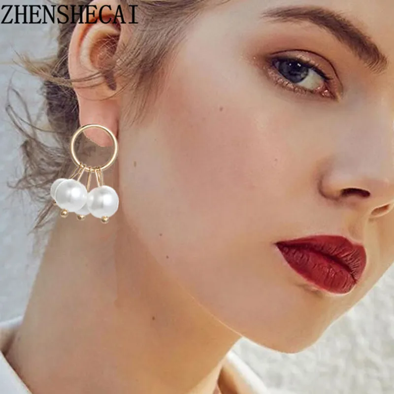 

New hollow long Round-shaped pendant earrings Sweet simulated pearl geometric tassel earrings Brinco women's fashion jewelry