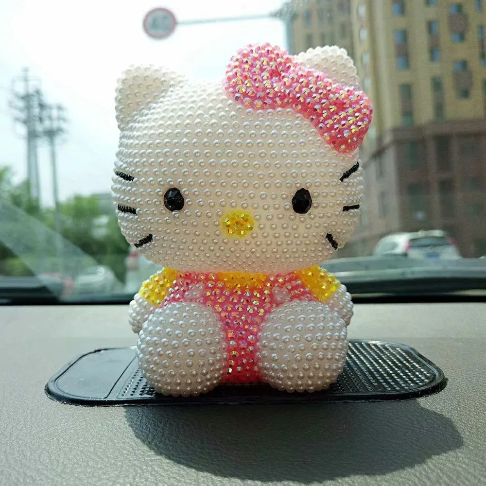 

Mini handmade pearl-encrusted hello kitty piggy bank decoration