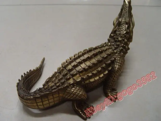 

Lifelike bronze statue of a crocodile