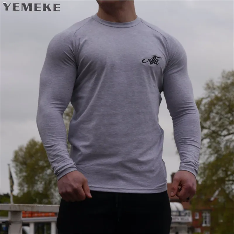 

YEMEKE Funny Design 2018 New Fitness Shirt Men Superman Bodybuilding Long Sleeve Male Autumn T Shirt athlete Tops Shirts