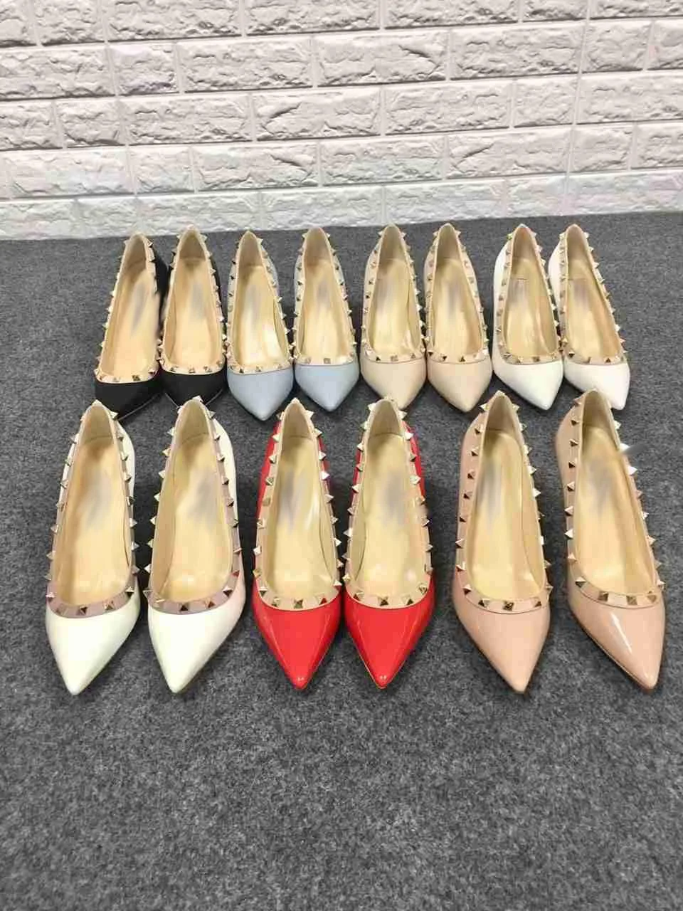 

Shoes woman leather rivet single shoes pointed flat with shallow mouth four seasons temperament fashion sexy luxury designer