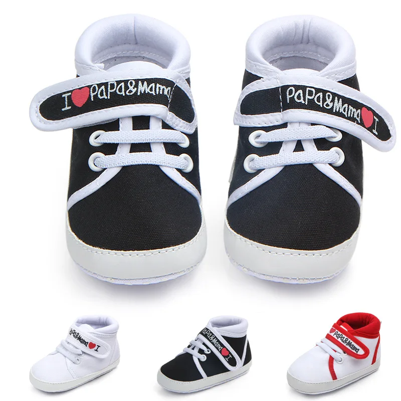 infant white canvas shoes