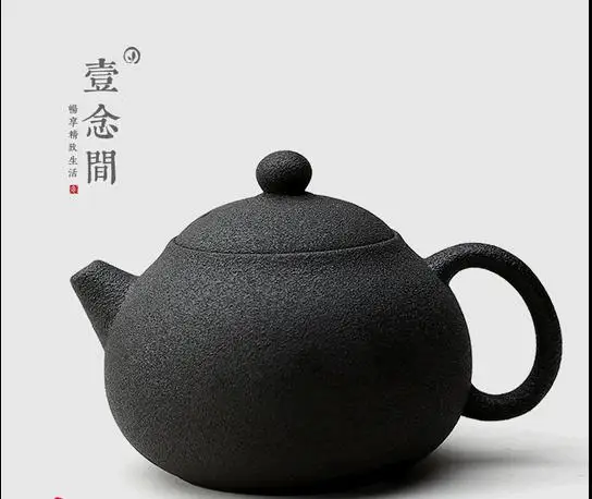 

Black pottery clay teapot ceramic Japanese kung fu tea single pot handmade rough pottery bonus 2 mouth cup