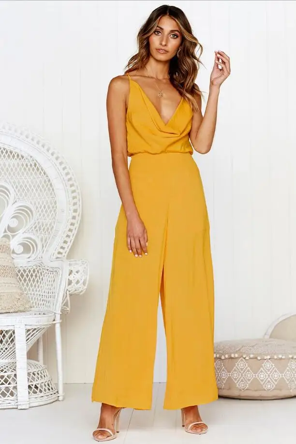 New Solid Strap Jumpsuit Women Deep V Neck Backless Combinaison Casual Boot Cut Overalls Loose Sleeveless Playsuit Women New Solid Strap Jumpsuit Women Deep V Neck Backless Combinaison Casual Boot Cut Overalls Loose Sleeveless Playsuit Women