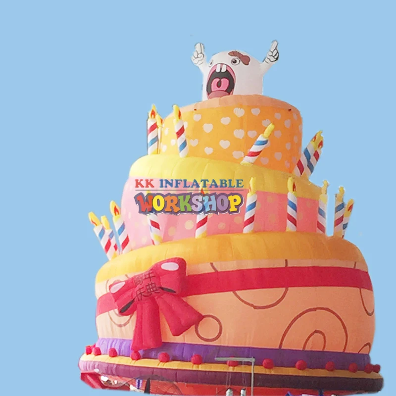 giant inflatable birthday cake with candles