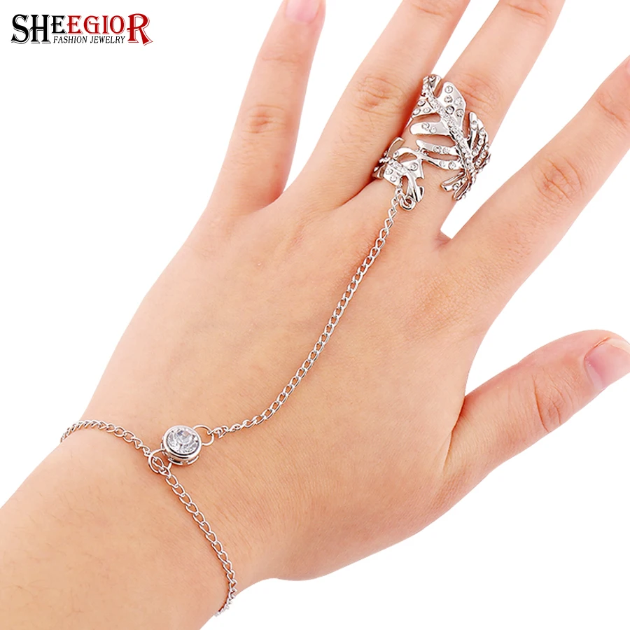 

SHEEGIOR Boho Crystal Leaf Wrist Chain Rings for Women Summer Beach Gold Silver Hand Link Finger Ring Men's Fashion Jewelry Gift