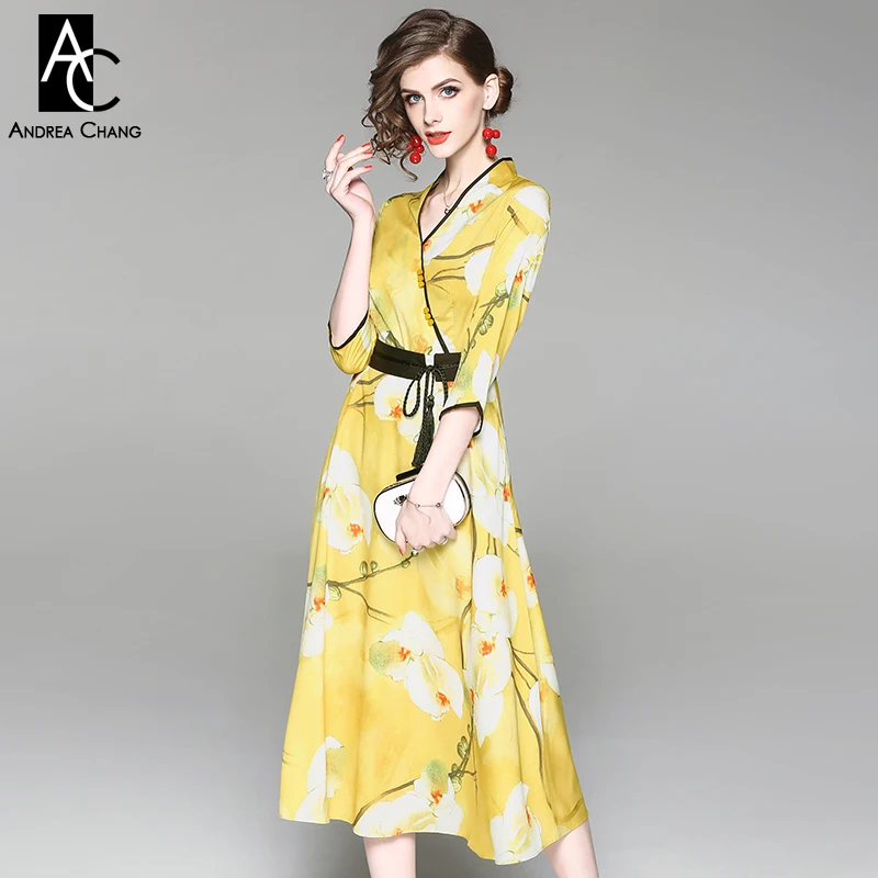 yellow dress with black belt