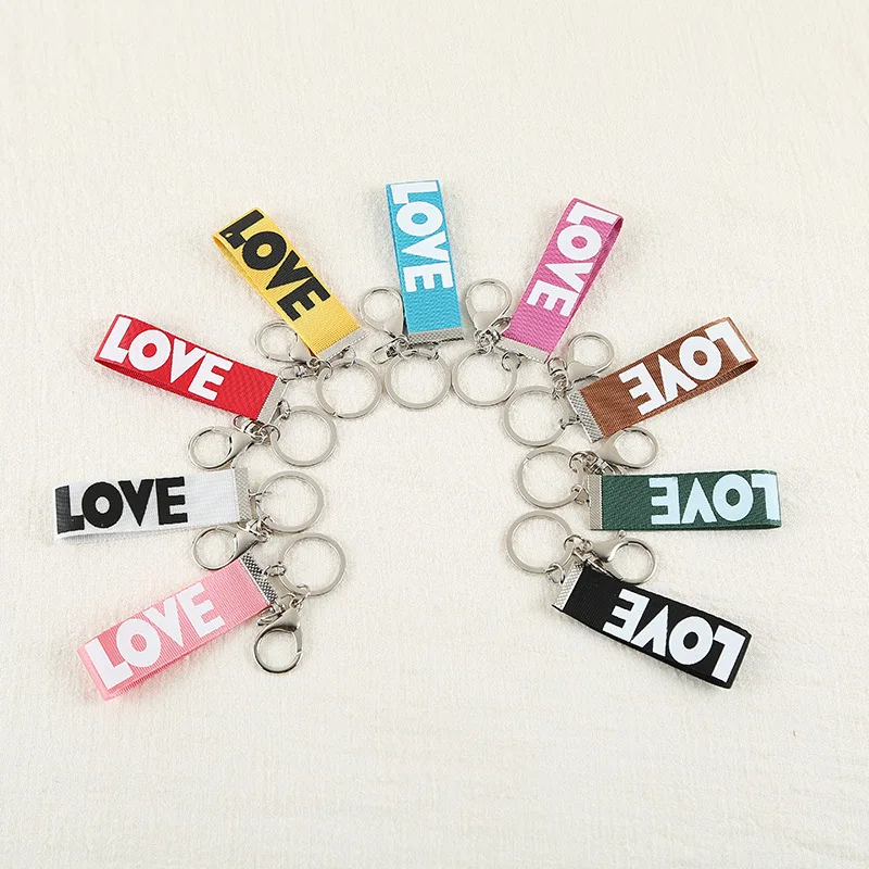 

1PCS Fashion New letter ribbon key ring pendant Keychain Jewelry YS-320