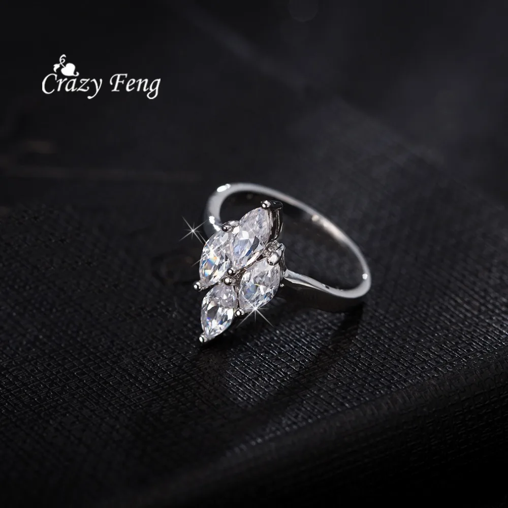 Женское кольцо с геометрическим рисунком серебряное фианитом для свадьбы или