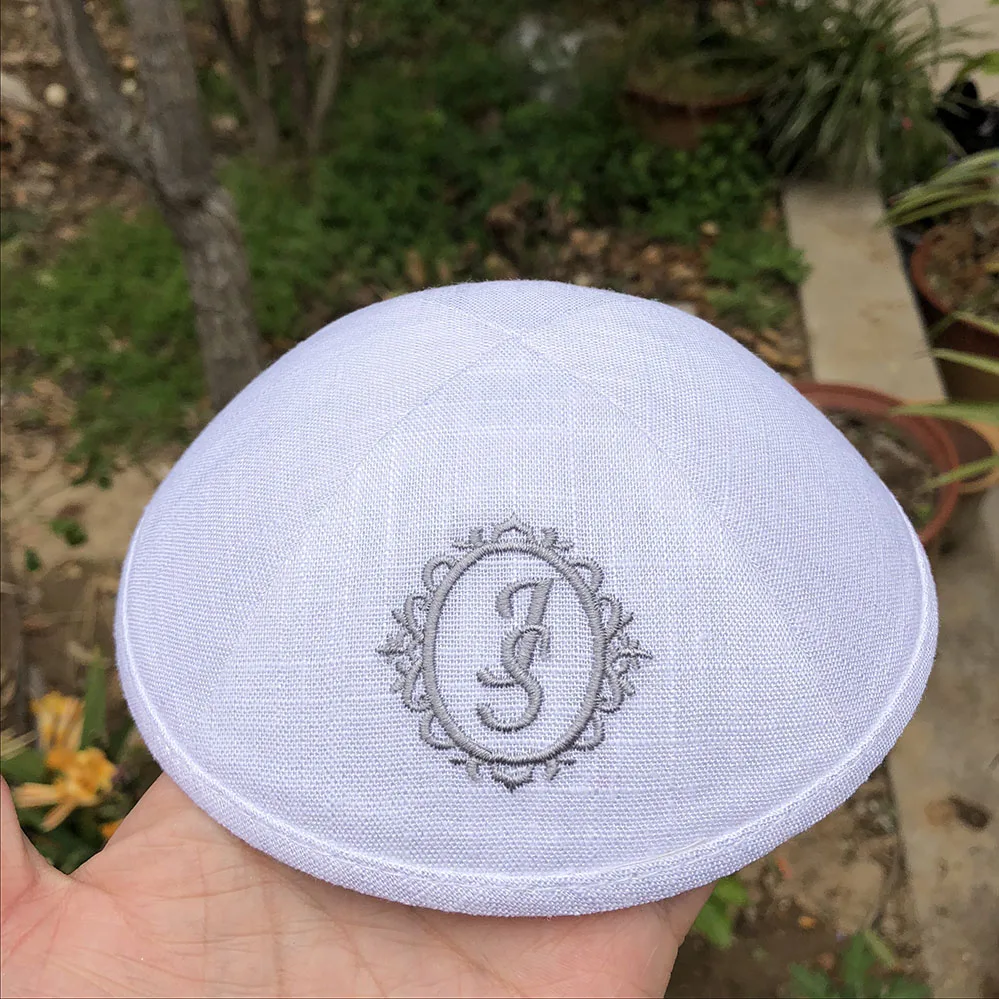 

WHITE LINEN KIPPAH WITH EMBROIDERY LOGO AS CLIENT OFFERED
