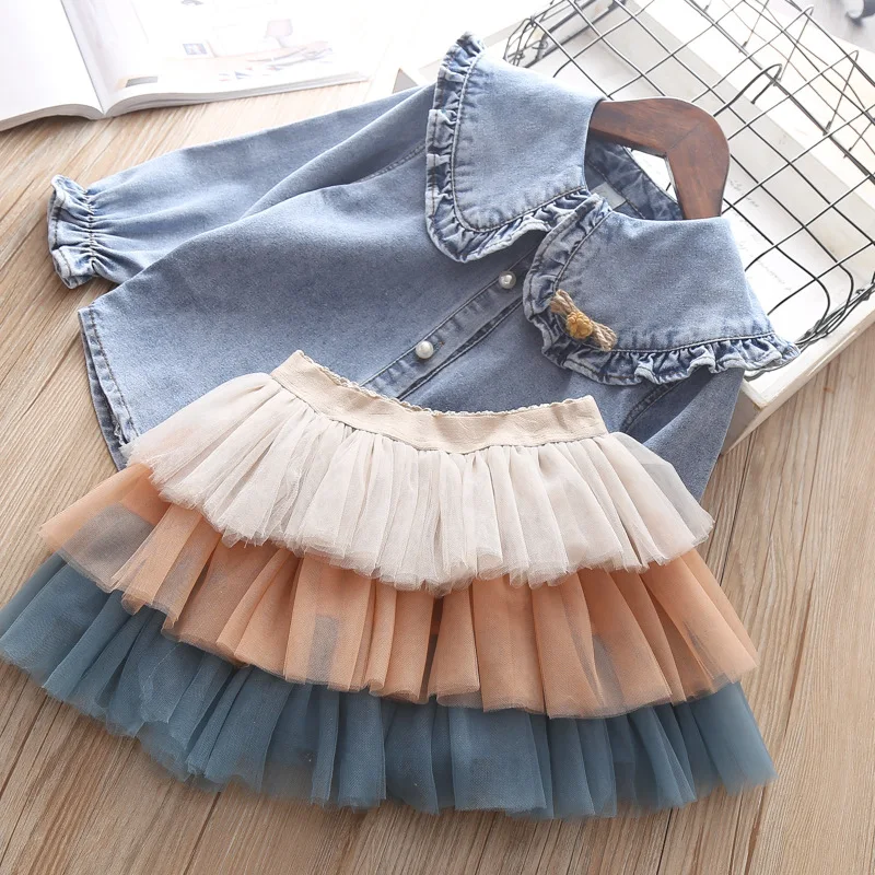 

Girls Skirt Set 2019 Spring New Girls Lotus Leaf Collar Denim Shirt + Cake Skirt Stitching Skirt Two-piece