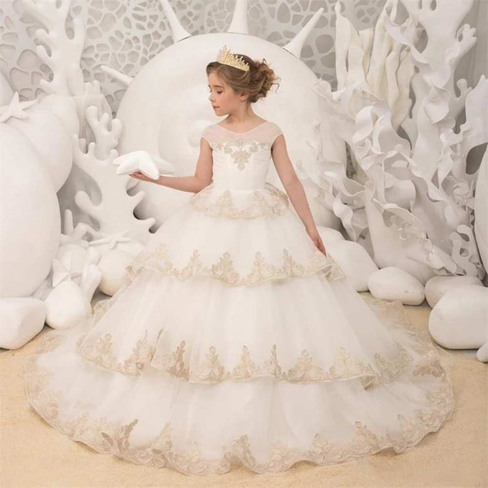 

Ivory Tulle Ball Gown Flower Girl Dresses with Champagne Lace Appliqued Jewel Neck Cap Sleeves Birthday Party Pageant Gowns