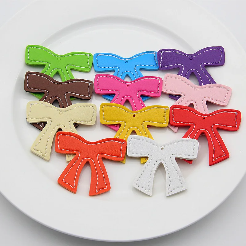 

New 10Pcs Colorful Butterfly Knot Handmade Leather Labels For Clothes PU Label Tags For Jeans Bags Shoes DIY Sewing Accessories