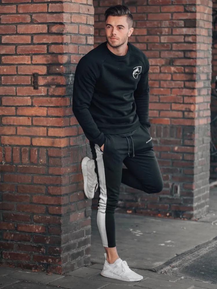 Alphalete бренд осень зима фитнес для мужчин спортивные брюки Модные хлопковые узкие брюки для бодибилдинга высокое качество Jogger брюки для