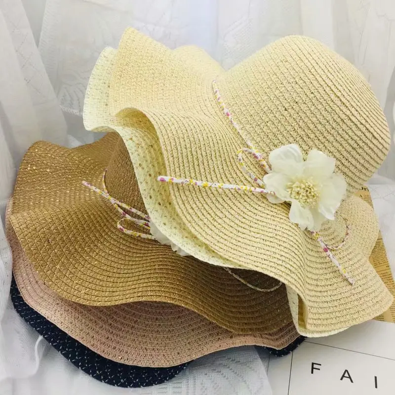

2019 new fashion women Sun Caps High quality wavy straw hat Beach Casual Flower Bow Caps