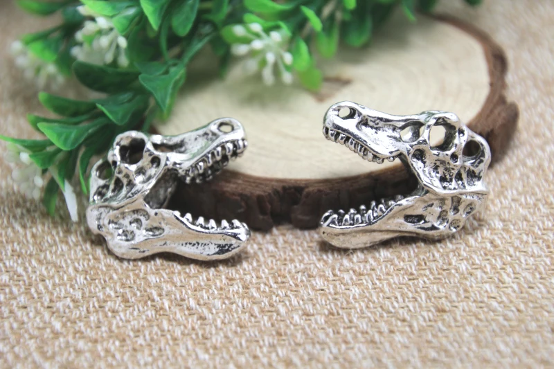 

2pcs- T Rex Charm Silver tone T Rex Skull Dinosaur Pendants Charms Jewelry Making 33x29x12mm