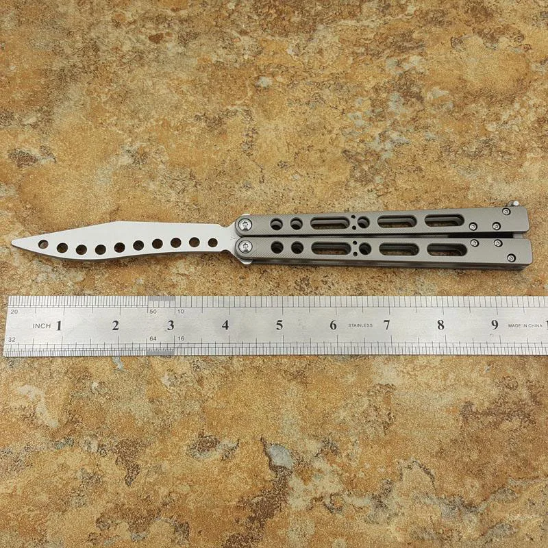 

Theone EX-10 Trainer Titanium handle Crown spine and edge Bushing system Butterfly in knives