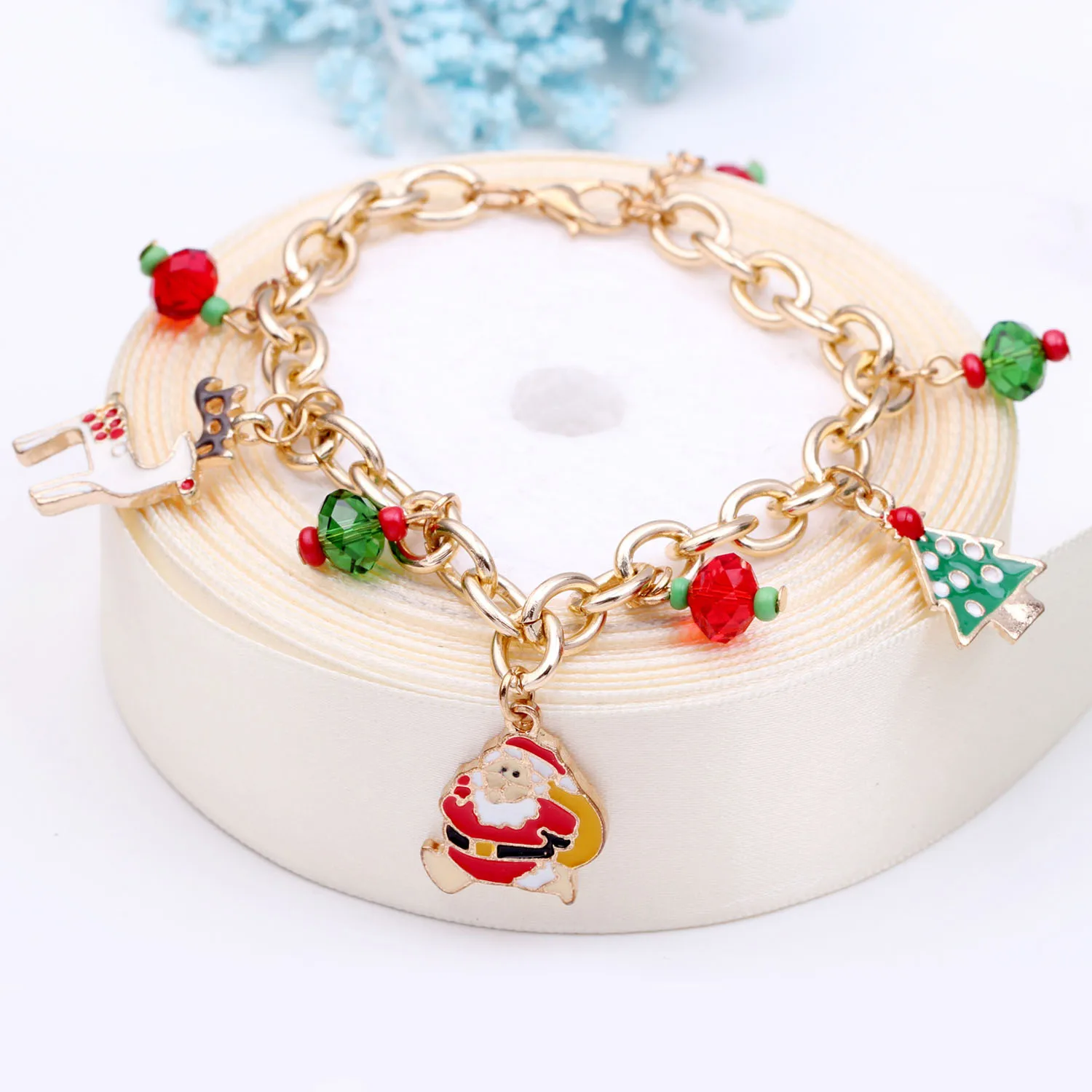 

Behogar Christmas Charm Bracelet with Cute Deer Santa Tree Pendant for Girls Women Birthday Christmas Xmas Gifts