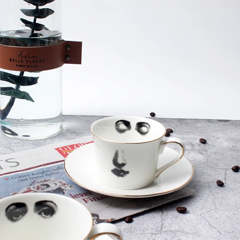 

Eye and Nose Coffee Cup and Saucer Set Quality Bone ChinaTazza Afternoon Tea Supply Elegant Wedding Tableware Girl Friend Gift