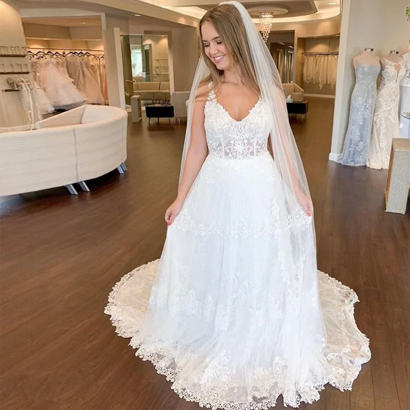 

Plus Size V-neck Wedding Dress Sleeveless Illusion Bodice Bridal Gown Appliques Long vestidos de novia Chapel Train Wedding Gown