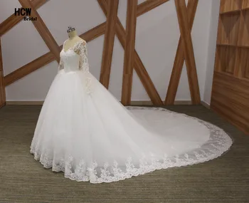 

Romantic Long Sleeve Royal Train Wedding Dress V Neck See Through Back Beaded Lace Princess Wedding Dresses With Long Train